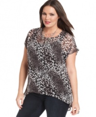 Pounce on Seven7 Jeans' short sleeve plus size top, featuring a fierce animal print and high-low hem.