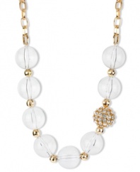 Polish up your party look. Haskell's chic frontal necklace mixes clear round beads with crystal fireballs and small gold tone faceted spacers. Crafted in gold tone mixed metal. Approximate length: 21 inches + 3-inch extender. Approximate drop: 1 inches.