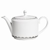 Vera Wang introduces Flirt fine bone china dinnerware. This platinum banded pattern features a modern scallop lace motif and a contemporary take on traditional lace work. Decoration on the inner verge of the accent plate, bread and butter and tea saucer adds a flirtatious touch of whimsy.