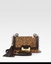 Beautiful leopard print hair calf with supple leather trim, perfect for all your essentials.Detachable leather and chain shoulder strap, 23½ dropTurnlock flap closureDetachable tassel accentOne outside open pocketOne inside zip pocketFully lined6¾W X 5H X 1½DImported