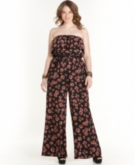 Dive into the jumpsuit craze with American Rag's strapless plus size style, highlighted by a ruffled neckline and belted waist. (Clearance)