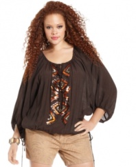 Sport a boho vibe with Baby Phat's three-quarter sleeve plus size peasant top, accented by a beaded front.
