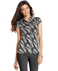 Alfani jazzes up a classic polo with an eye-catching graphic print -- a great petite basic for your wardrobe!