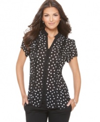 A classic look that's contemporary cool-NY Collection's petite polka dot top features an of-the-moment, must-have print along with stylish ruffled cuffs.