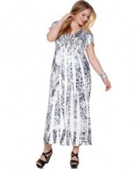 Spring into a stunning look with Style&co.'s short sleeve plus size maxi dress, featuring a vivid sublimated print.