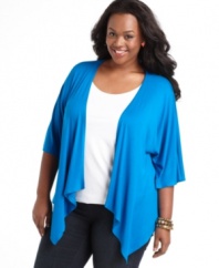 Layer your sleeveless looks with ING's short sleeve plus size cardigan, punctuated by a handkerchief hem.