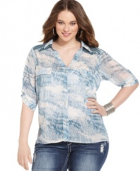 Rock a groovy print with American Rag's three-quarter sleeve plus size top, finished by a crocheted back.