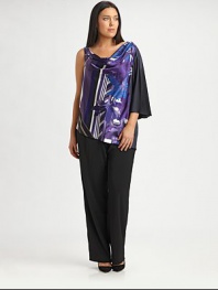 If you're looking for a flattering top to truly complement your shape, look no further than this stretch-satin design featuring an irresistible print. Pair it with your favorite straight-leg or slim-fit pants. One-shoulder styleDraped necklineOne sleeveGraphic print on frontAbout 30 from shoulder to hem97% polyester/3% elastaneDry cleanImported