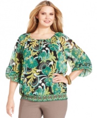 Enliven your casual look with Style&co.'s plus size peasant top, highlighted by a vibrant print-- dress it up with trousers or down with denim.