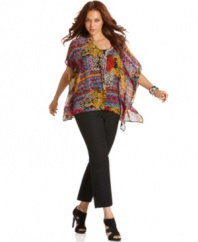 Spice up your style with NY Collection's batwing sleeve plus size top, featuring a lace-up neckline.