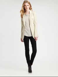 An irresistible take on the classic blazer, this sleek design features creamy leather to complement its crisp, clean lines. Leather along notched collarLong sleevesLeather trimButton closureWelt pocketsFully linedAbout 28 from shoulder to hem48% polyester/48% viscose/4% elastaneDry clean by leather specialistImported Model shown is 5'10 (177cm) wearing US size 4. 