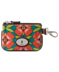 Change things up with this colorful coin purse from Fossil that discretely slips into a pocket or handbag without a worry. The sturdy coated canvas is equipped with secure top zipper, side clip and interior ID window, so your essentials stay safe and secure.