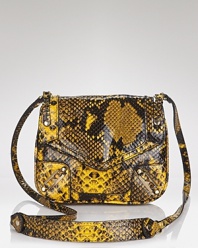 Serpentine style plays muse to this exotically-embossed leather crossbody from Rebecca Minkoff. Snake, rattle, and roll, this piece is ready to slither from desk-to-dinner with audacious ease.