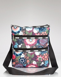 LeSportsac's signature crossbody is updated in a floral-printed nylon. This cooly functional bag features exterior pockets and an adjustable strap for effortless on-the-go style.