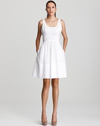 Freshen your summer style with this Calvin Klein Petites sundress in a flattering silhouette with a subtle burnout print. Complement the sophisticated shade with a neutral knit and nude heels for understated elegance.