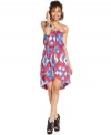 An abstract tribal-print adds serious color magic to this wrap-style halter dress from Eyeshadow!