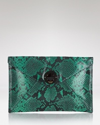 Take kate spade new york out for the night with this snake-embossed leather clutch. Its slim profile is unfailingly understated, while its exotic look makes for a little black dress upping statement.