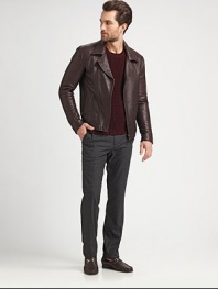 This supple lambskin leather jacket is the ideal representation of modern style. Notched collarFront zipperZipper slash pocketsAbout 25 from shoulder to hemLambskin leatherDry cleanImported