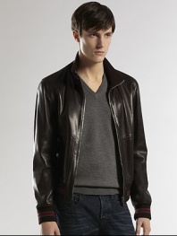 Sleek and modern bomber style in Italian leather with signature web detail at the collar, cuffs and hem.Zip frontStand collarSide slash pocketsRibbed knit cuffs and hemAbout 25 from shoulder to hemLeatherDry cleanMade in Italy
