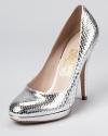 Shimmering in snakeskin, these metallic pumps from Salvatore Ferragamo add gleaming glamour to day or night.
