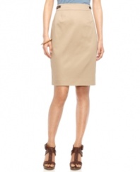 Pair this petite Calvin Klein pencil skirt with a simple, tucked-in top to show off the chic faux leather buckles at each side of the waist.