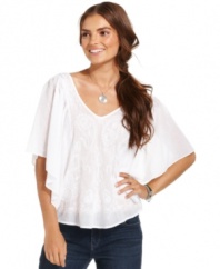 This elegant petite top from DKNY Jeans' will keep you stylishly comfortable in the heat! The lightweight voile fabric and butterfly sleeves give it an ethereal quality.