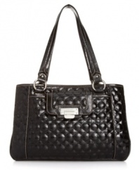 Quilty as charged! This classic quilted design from Nine West features a lady-like satchel silhouette with shiny silvertone hardware and a signature front plaque.