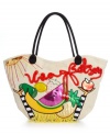 Viva la vida loca. Play-up your less serious side with this care-free canvas tote from Betsey Johnson. Satiny fruit cut-outs, glittery gold sequins and eye-catching red ribbon decorate the front, making this carryall a fun seasonal essential.