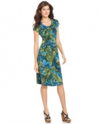 A simple silhouette balances out the bold snakeskin print on this petite dress from Elementz.