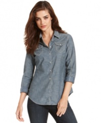 Whether worn loose and layered or all buttoned up, this petite chambray shirt from Calvin Klein Jeans is a staple you'll love season after season. Try it with dark denim for a chic monochromatic look!
