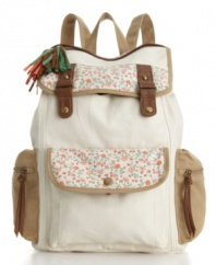 Pack it all up and be on your way to great style with this adorable backpack from American Rag. Sweet floral detail and a fun multicolor tassel add the perfect touches to this cheerful design.