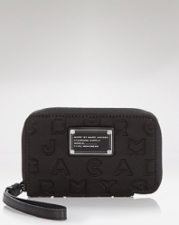 MARC BY MARC JACOBS' translates its always on-trend style to technology with this neoprene iPhone wristlet. Printed with the designer's signature dreamy motif, it's a case that's totally on point.