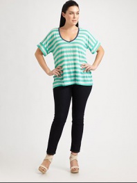 Designed to flatter your figure, this easy jersey top features a feminine neckline and classic stripes.Deep v-neckDolman sleevesContrast solid trimPull-on styleAbout 27 from shoulder to hem50% rayon/50% polyesterMachine washMade in USA