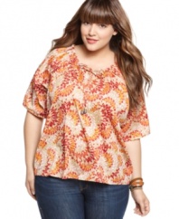 A pretty print dresses up One World's plus size top. Try it with jeans and hoop earrings for boho-chic look!
