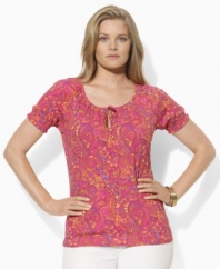 A colorful paisley print lends graphic elegance to this plus size short-sleeved top from Lauren by Ralph Lauren, designed in light-as-air tissue cotton with smocked cuffs and a chic keyhole at the front.