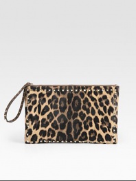 A compact shape of leopard-printed pony hair, finished with sleek metal studs and a leather wristlet strap. Studded leather wristlet strap, 7 dropTop zip closureOne inside zip pocketTwo inside open pocketsCotton lining14W X 9H X ½DMade in Italy