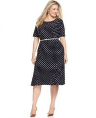 Polka dots are a playful finish to this sleek plus size dress from Jones New York. A skinny belt lends the perfect amount of definition at the waist.