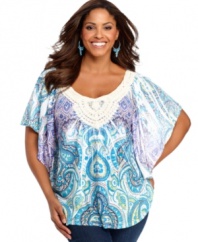 Capture a bohemian spirit with Style&co.'s butterfly sleeve plus size top, featuring an electrifying print.