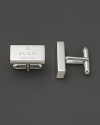 Sterling silver Gucci trademark cuff links.