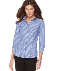 Jones New York Signature offers a tailored petite look with this crisp, classic striped button-up shirt.
