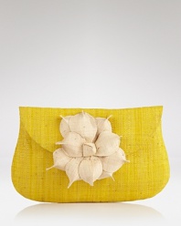 Swap the beach bag for something smaller. mar Y sol's woven raffia clutch with a flower detail is a tropical take along that keeps the essentials handy once the sun sets.