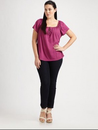 You are destined to find this ultra-soft supima cotton and micro modal top irresistible. This feminine top features a self-tie neckline with flattering gathered details.Self-tie gathered necklineShort sleevesCurved hemPull-on styleAbout 25 from shoulder to hem50% supima cotton/50% micro modalMachine washMade in USA
