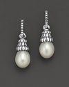 From the Luna Collection, fluted sterling silver settings and polished pearl drop earrings. Designed by Lagos.