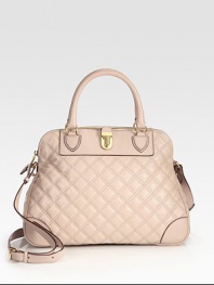 This elegantly quilted style is constructed with luxurious leather and features a decorative push-lock detail. Double top handles, 5 dropAdjustable shoulder strap, 17-22¾ dropTop zip closureProtective metal feetOne outside open pocketCotton lining14½W X 10H X 5½DMade in Italy