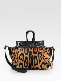 A slouchy shape in super-chic leopard-printed pony hair, finished with rich calfskin leather accents and side gussets. Double leather top handles, 2½ dropLeather shoulder strap, 18 dropMagnetic snap closureOne inside zip pocketOne inside open pocketCotton lining7¾W X 7¼H X 4DImported