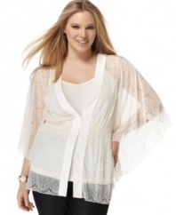 Add a romantic touch to your casual look with NY Collection's batwing sleeve plus size top, crafted from lace.