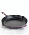 A classic kitchen workhorse, Le Creuset's heavyweight skillet is a culinary tradition crafted to sear and fry with professional precision. The expertly enameled cast iron exterior ensures uniform heating and even cooking, while the satin black enamel interior seals in juices and flavors. Limited lifetime warranty.
