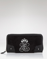No purse is complete without the right wallet, and Juicy Couture's velour style ensures ultra-glam daytime style. Cleverly designed with multiple pockets, it's an effortless essential.