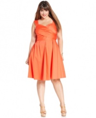 Look lean and lovely in Spense's sleeveless plus size dress, featuring a slenderizing crisscross front and A-line shape.