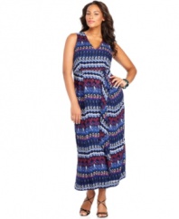 Be a stylish standout with DKNYC's sleeveless plus size maxi dress, flaunting a spirited print and ruffled front.
